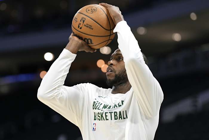 Milwaukee Bucks forward Khris Middleton (22) shoots during warmups prior to the game against the Washington Wizards